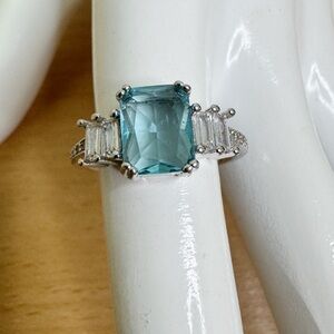 Stunning Silver Tone Fashion Ring with Aquamarine Blue Stone